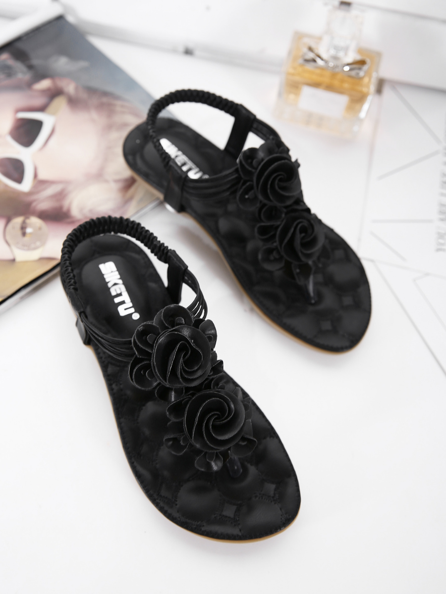 SIKETU | Schwarze Sandalen mit Rosetten 