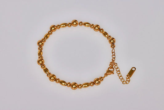 Pulsera de botón de oro 