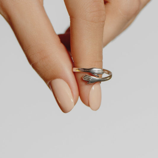Anillo de abrazo de plata esterlina