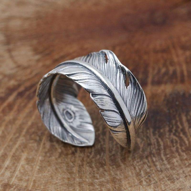 ANILLO DE PLATA CON PLUMA HECHO A MANO