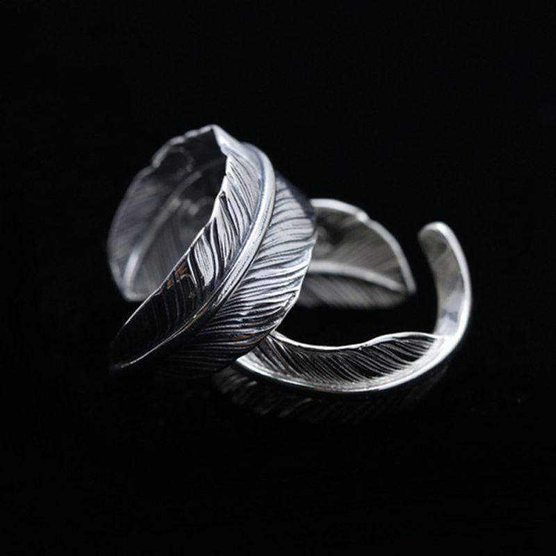 ANILLO DE PLATA CON PLUMA HECHO A MANO