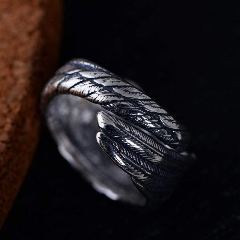 ANILLO DE PLATA CON PLUMA TALLADA