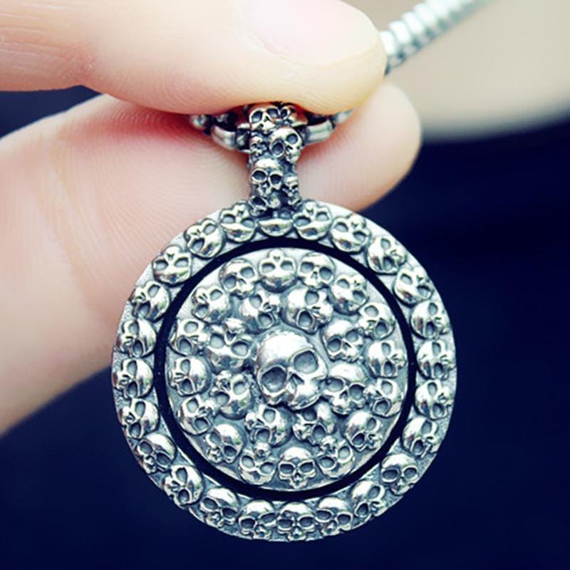 TURNABLE SKULL DISC PENDANT