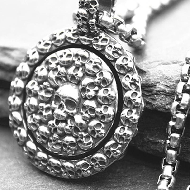TURNABLE SKULL DISC PENDANT