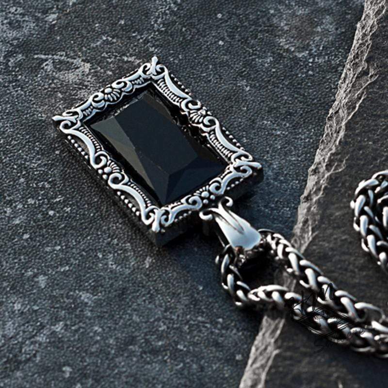VINTAGE CARVED BLACK GEMSTONE PENDANT